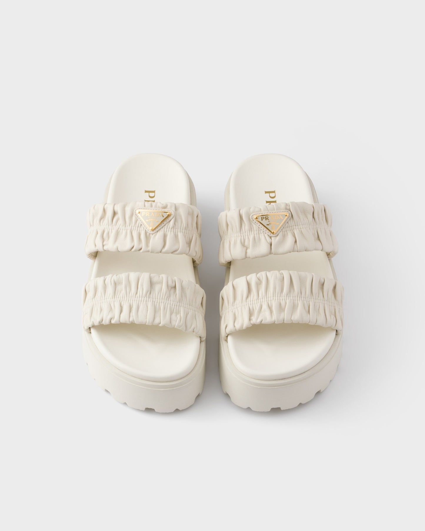 Prada Matelassé nappa leather flatform slides White