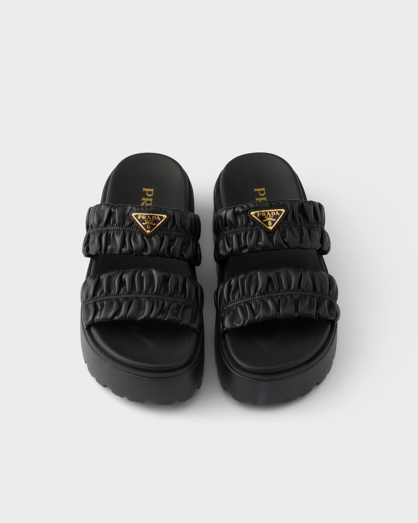 Prada Matelassé nappa leather flatform slides